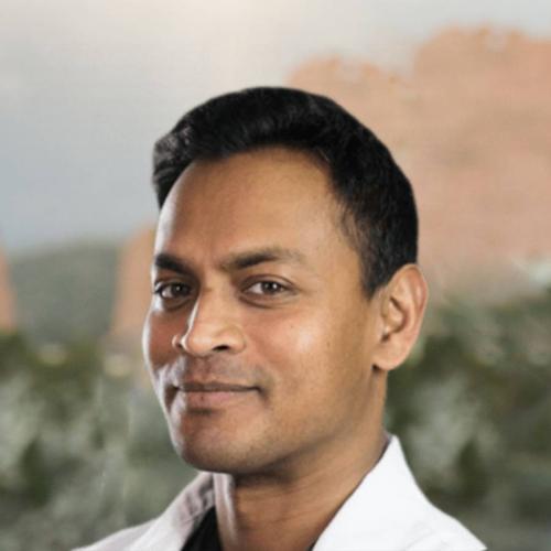 Dr. Chris Thiagarajah headshot